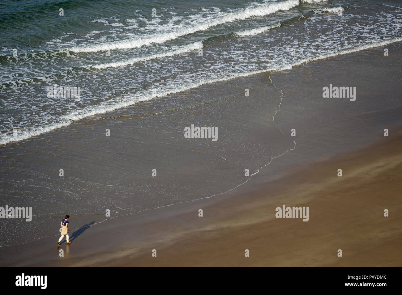 Woman alone beach hi-res stock photography and images - Alamy