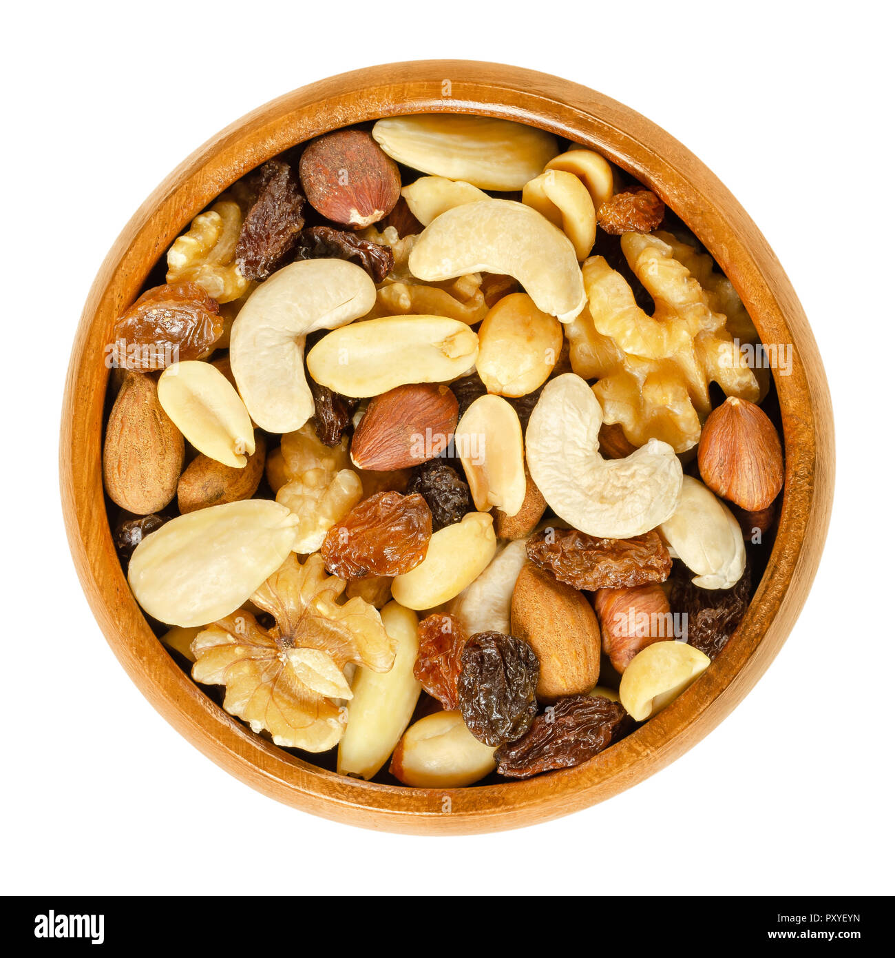 Student food in wooden bowl. Student fodder. Snack mix of dried almonds, cashews, peanuts, walnuts, hazelnuts and raisins. Trail mix. Stock Photo