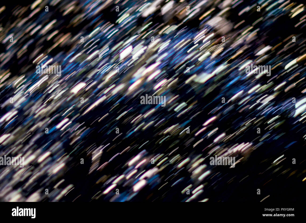 Blurred distorted motion background texture. Aluminum swarfs Stock Photo