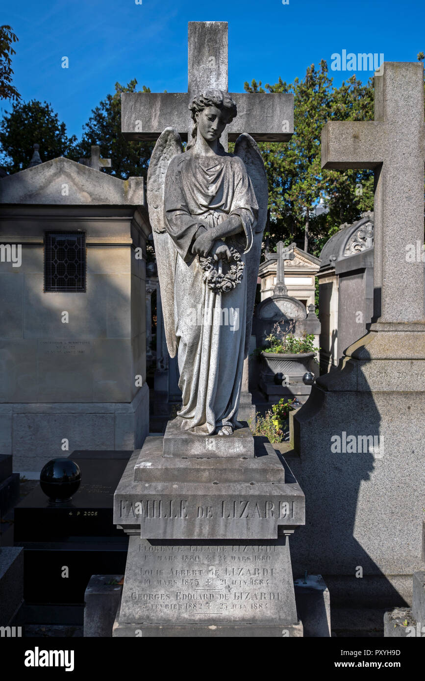 An angel stands by the Lizardi Family grave in Passy Cemetery, Paris, France. Stock Photo