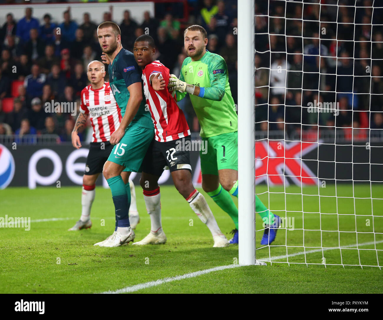 Eindhoven, Netherlands. October 24. 2018 L-R Tottenham Hotspur's Eric Dier Denzel Dumfries of PSV Eindhoven and Jeroen Zoet of PSV Eindhoven during UAFA Champion League Group B match between PSV Eindhoven and Tottenham Hotspur at Phillips Stadium, Eindhoven, Netherlands on 24 Oct 2018. Editorial use only, license required for commercial use. No use in betting, games or a single club/league/player publications. Credit: Action Foto Sport/Alamy Live News Stock Photo