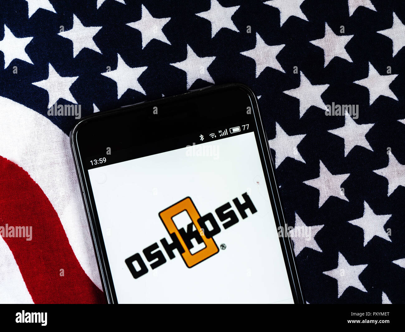 Kiev, Ukraine. 24th Oct, 2018. Oshkosh Corporation Defence industry company logo seen displayed on smart phone. Oshkosh Corporation, formerly Oshkosh Truck, is an American industrial company that designs and builds specialty trucks, military vehicles, truck bodies, airport fire apparatus and access equipment. Credit: Igor Golovniov/SOPA Images/ZUMA Wire/Alamy Live News Stock Photo