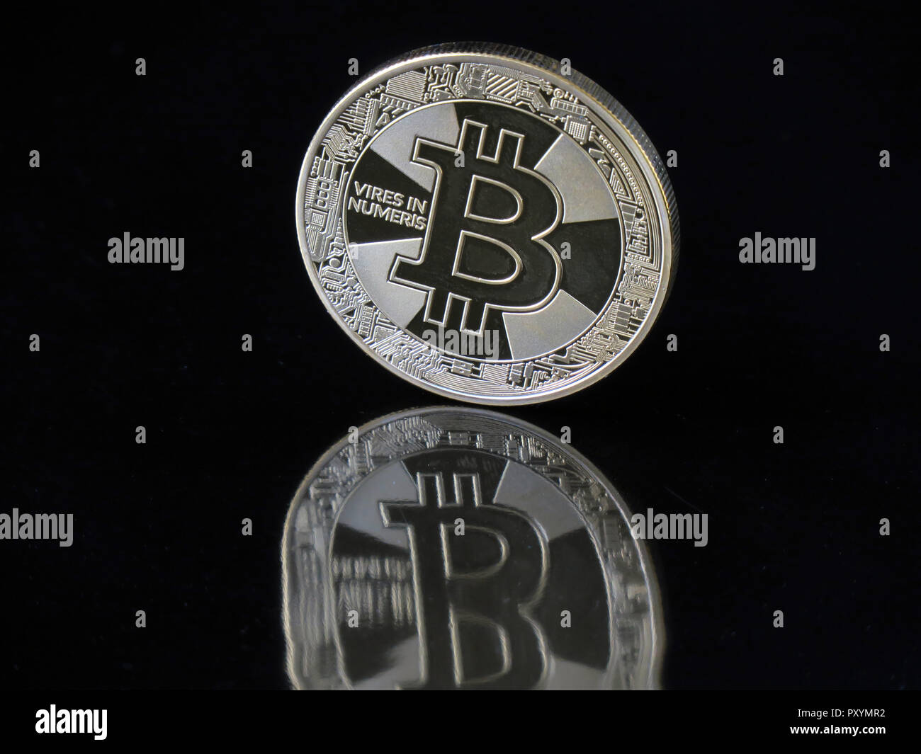 Berlin, Germany. 30th Aug, 2018. 30 August 2018, Germany, Berlin: A Bitcoin  coin with the imprint 