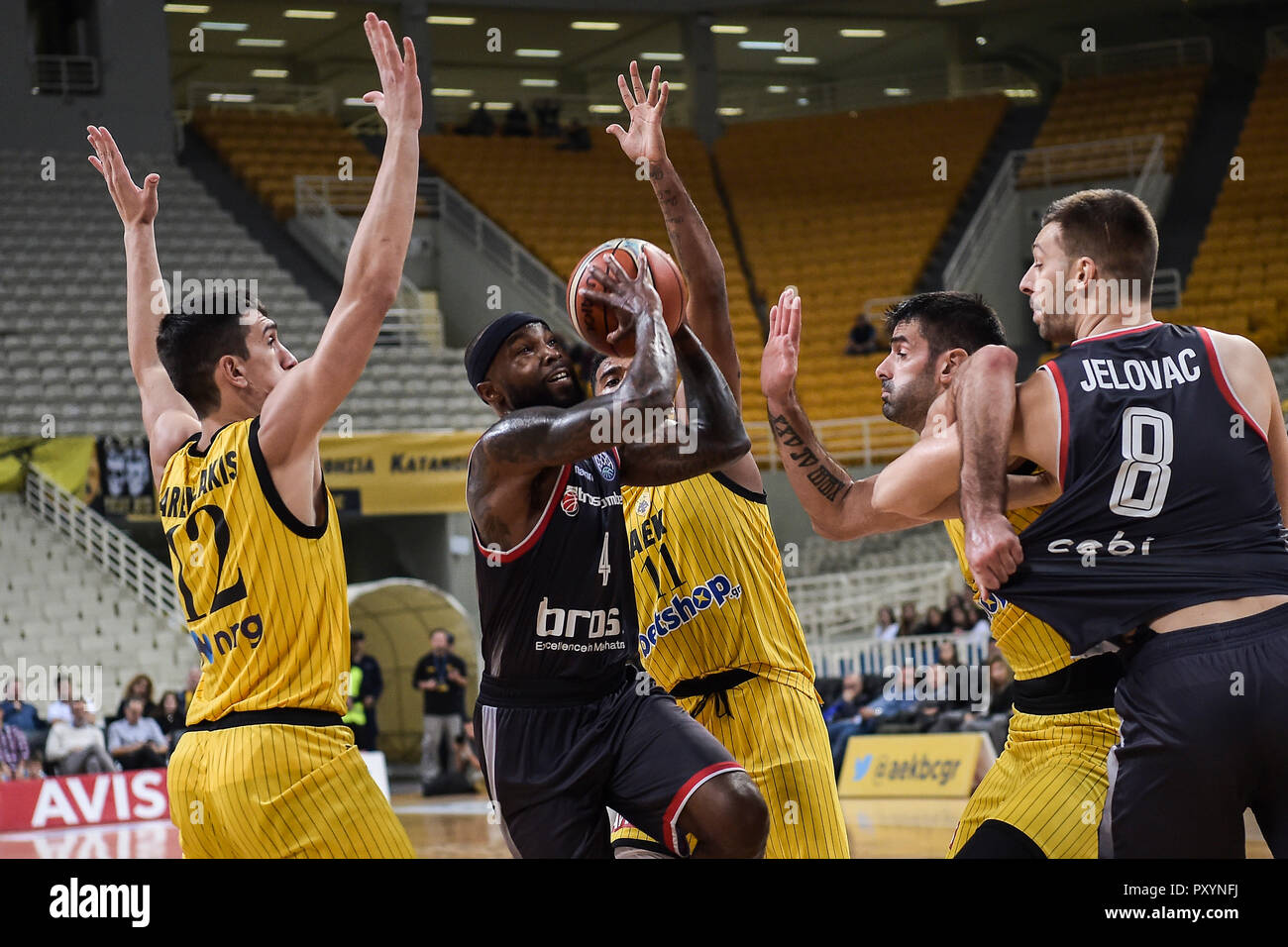Athens, Greece. 24th Oct, 2018. 24 October 2018, Greece, Athens:  Basketball: Champions League, preliminary round, Group C, 3rd matchday, AEK  Athens - Brose Bamberg. Tyrese Rice (C) by Brose Bamberg and Giannoulis