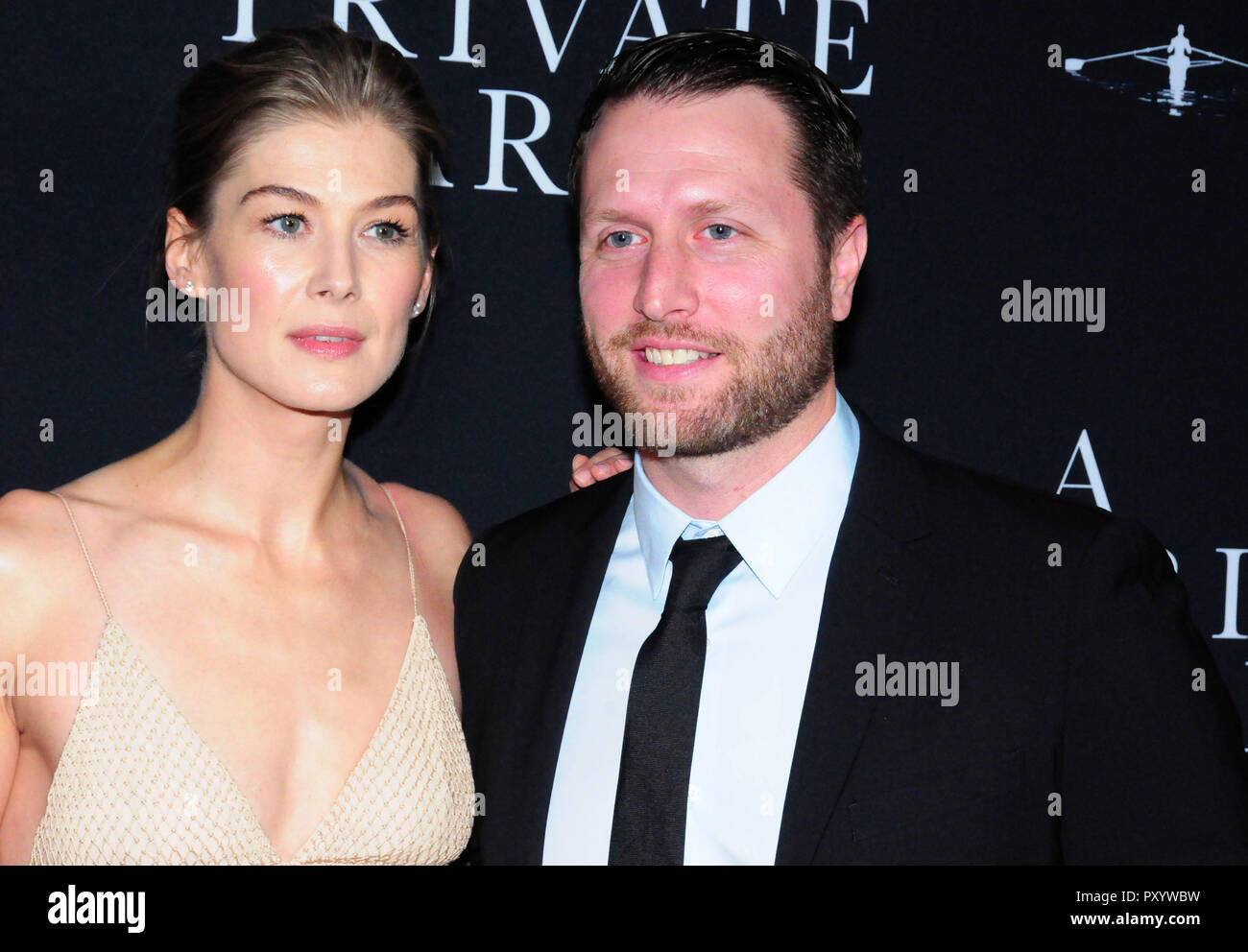 Beverly Hills, California, USA. 24th October, 2018. Actress Rosamund Pike and director Matthew Heineman attend the Los Angeles Premiere of Aviron Pictures' 'A Private War' at Samuel Goldwyn Theater in Beverly Hills, California. Photo by Barry King/Alamy Live News Stock Photo