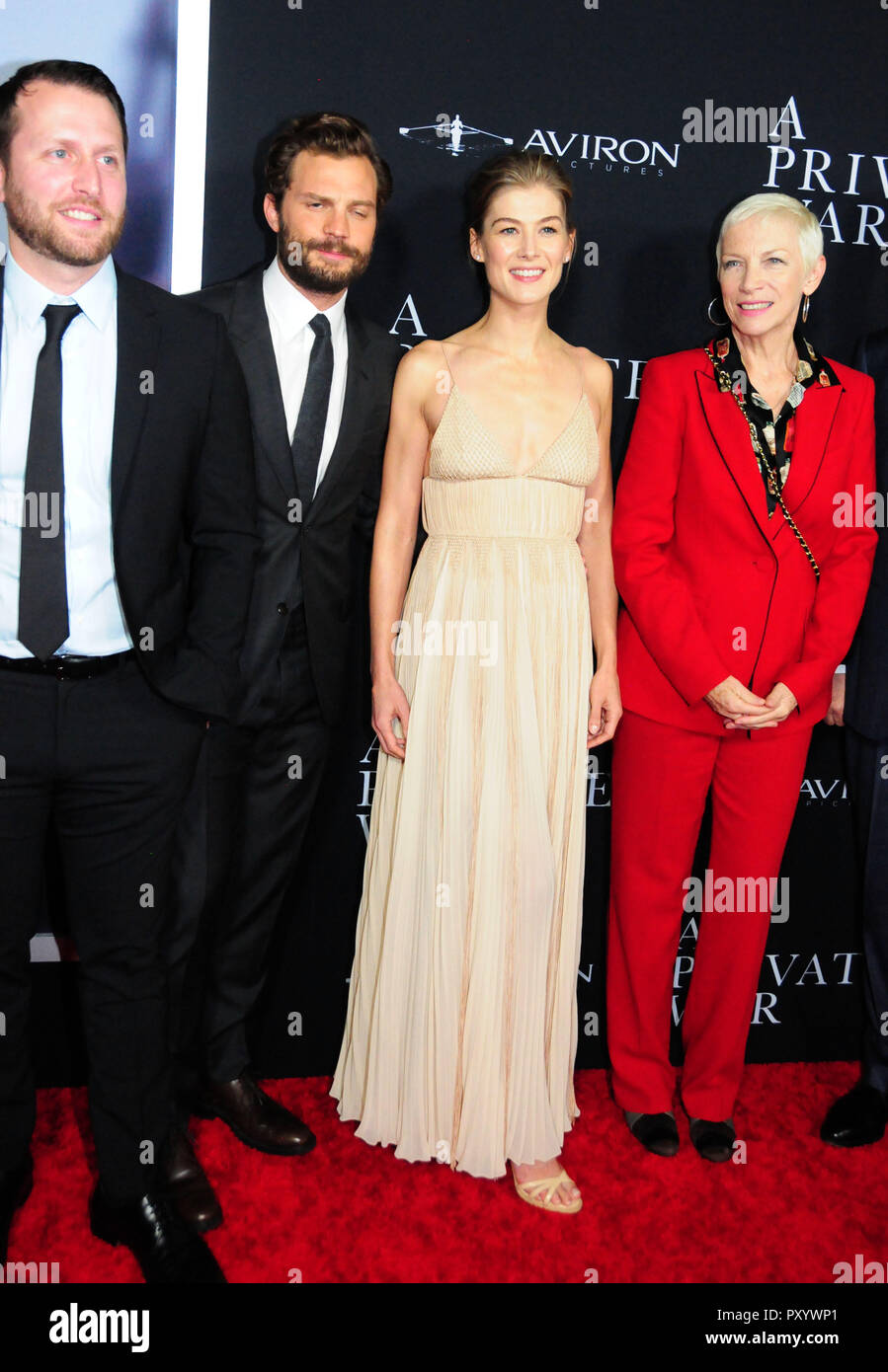 Beverly Hills, California, USA. 24th October, 2018. Director Matthew Heineman, actor Jamie Dornan, actress Rosamund Pike and singer Annie Lennox attend the Los Angeles Premiere of Aviron Pictures' 'A Private War' at Samuel Goldwyn Theater in Beverly Hills, California. Photo by Barry King/Alamy Live News Stock Photo