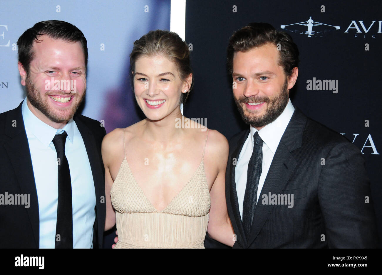 Beverly Hills, California, USA. 24th October, 2018. Director Matthew Heineman, actress Rosamund Pike and actor Jamie Dornan attend the Los Angeles Premiere of Aviron Pictures' 'A Private War' at Samuel Goldwyn Theater in Beverly Hills, California. Photo by Barry King/Alamy Live News Stock Photo