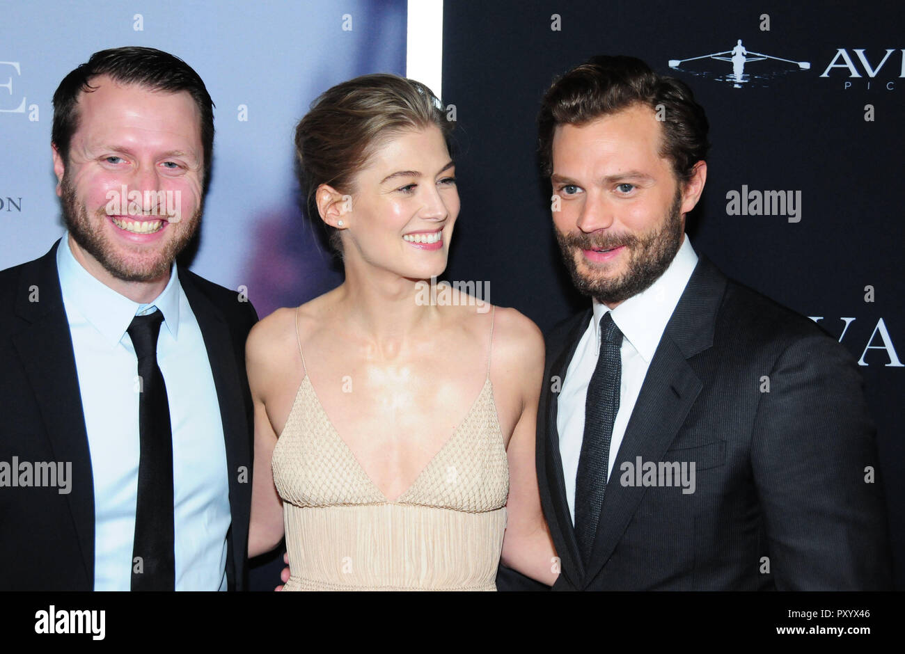 Beverly Hills, California, USA. 24th October, 2018. Director Matthew Heineman, actress Rosamund Pike and actor Jamie Dornan attend the Los Angeles Premiere of Aviron Pictures' 'A Private War' at Samuel Goldwyn Theater in Beverly Hills, California. Photo by Barry King/Alamy Live News Stock Photo