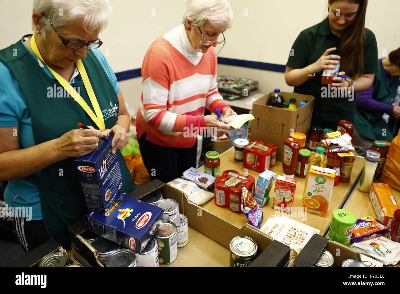 Gower Peninsula, Swansea, UK. 25th October 2018.  Swansea Foobank is experiencing high levels of demand, here at Gorseinon Institute, one of five foodbanks throughout the city.  One volunteer commented: 'the welfare state used to be the safety net but since Universal Credit, now it's the Foodbanks'. Swansea, Wales, Credit: Gareth Llewelyn/Alamy Live News. Stock Photo