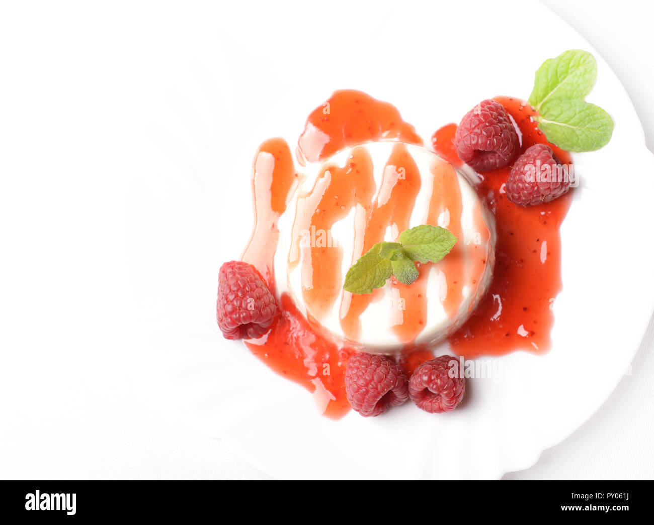 Italian dessert panna cotta with raspberries Stock Photo