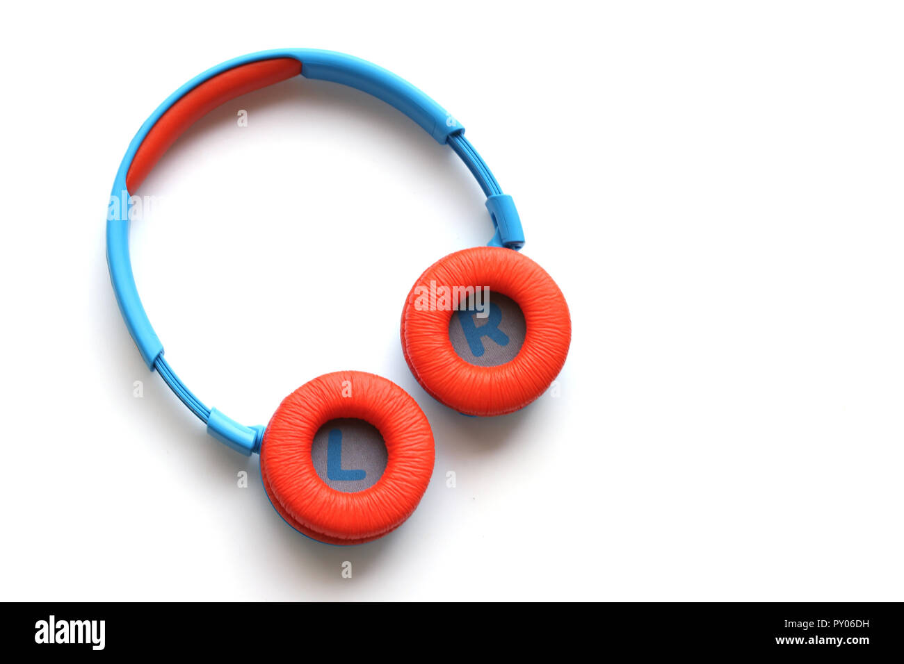 A child's wireless headphone isolated on a white background Stock Photo
