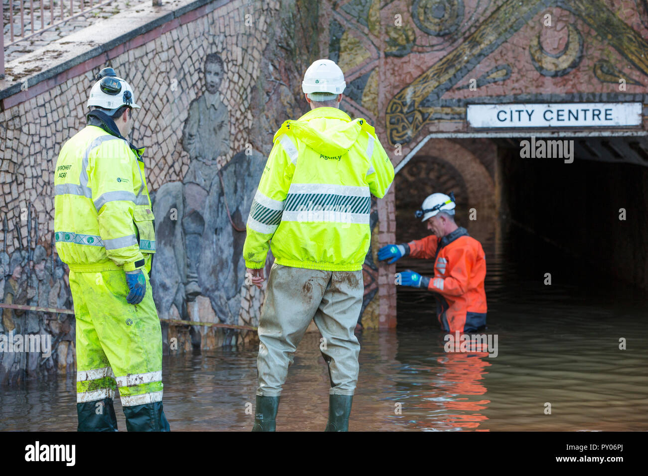 Environment Agency staff involved in pumping out floodwater from Hardwicke Circus in Carlisle, Cumbria on Tuesday 8th December 2015, after torrential rain from storm Desmond. The storm set a new British record for rainfsll totals in a day with 341.4mm falling in 24 hours. Stock Photo