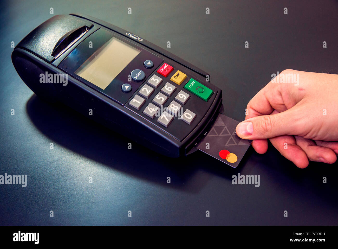 Male hand dials pin code on pin pad of card machine or pos terminal with  inserted blank white credit card isolated on white background. Payment with  c Stock Photo - Alamy