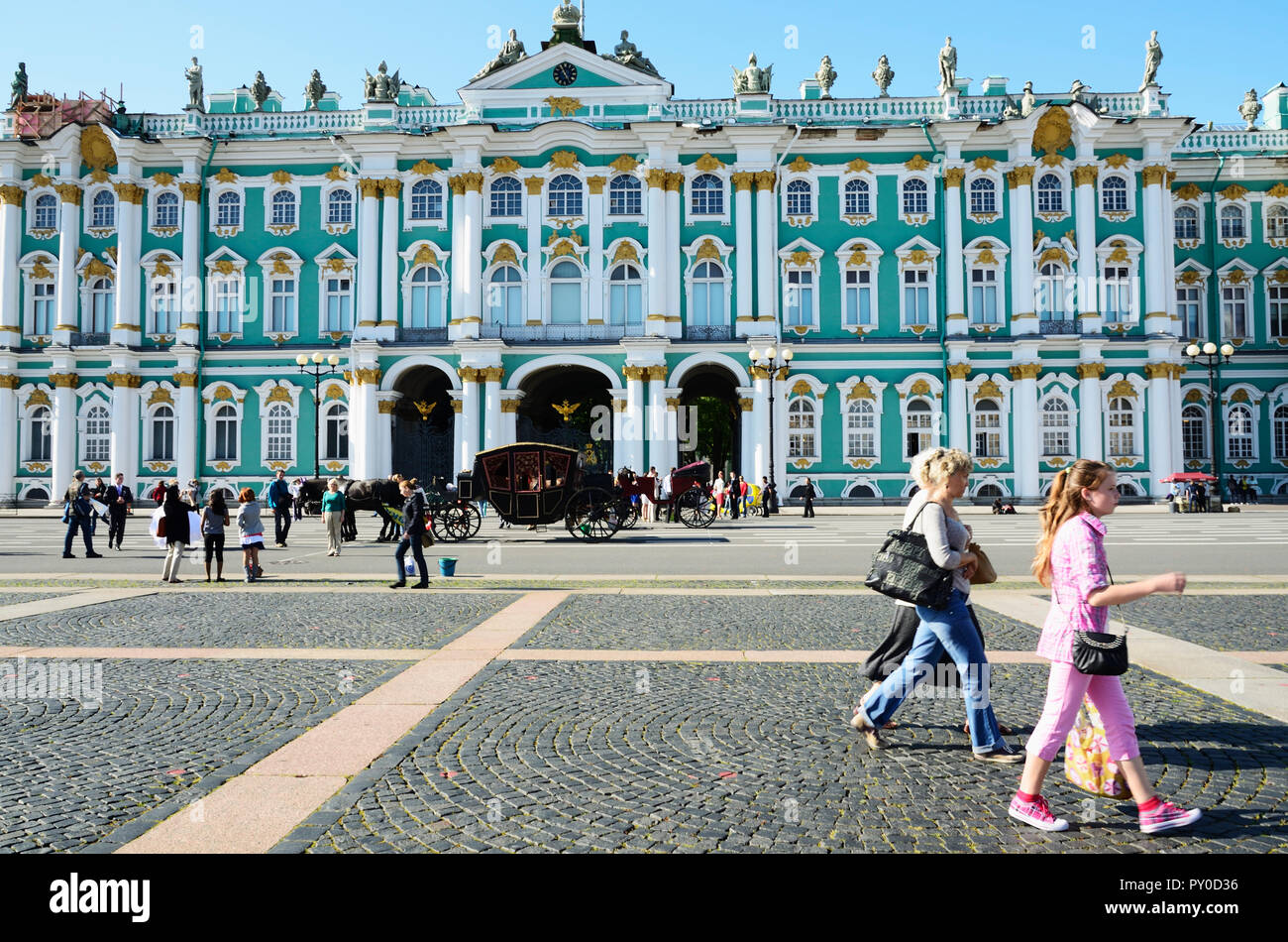 The Winter Palace facade. The Winter Palace was the official residence of the Russian monarchs. Today, the restored palace forms part of a complex of  Stock Photo