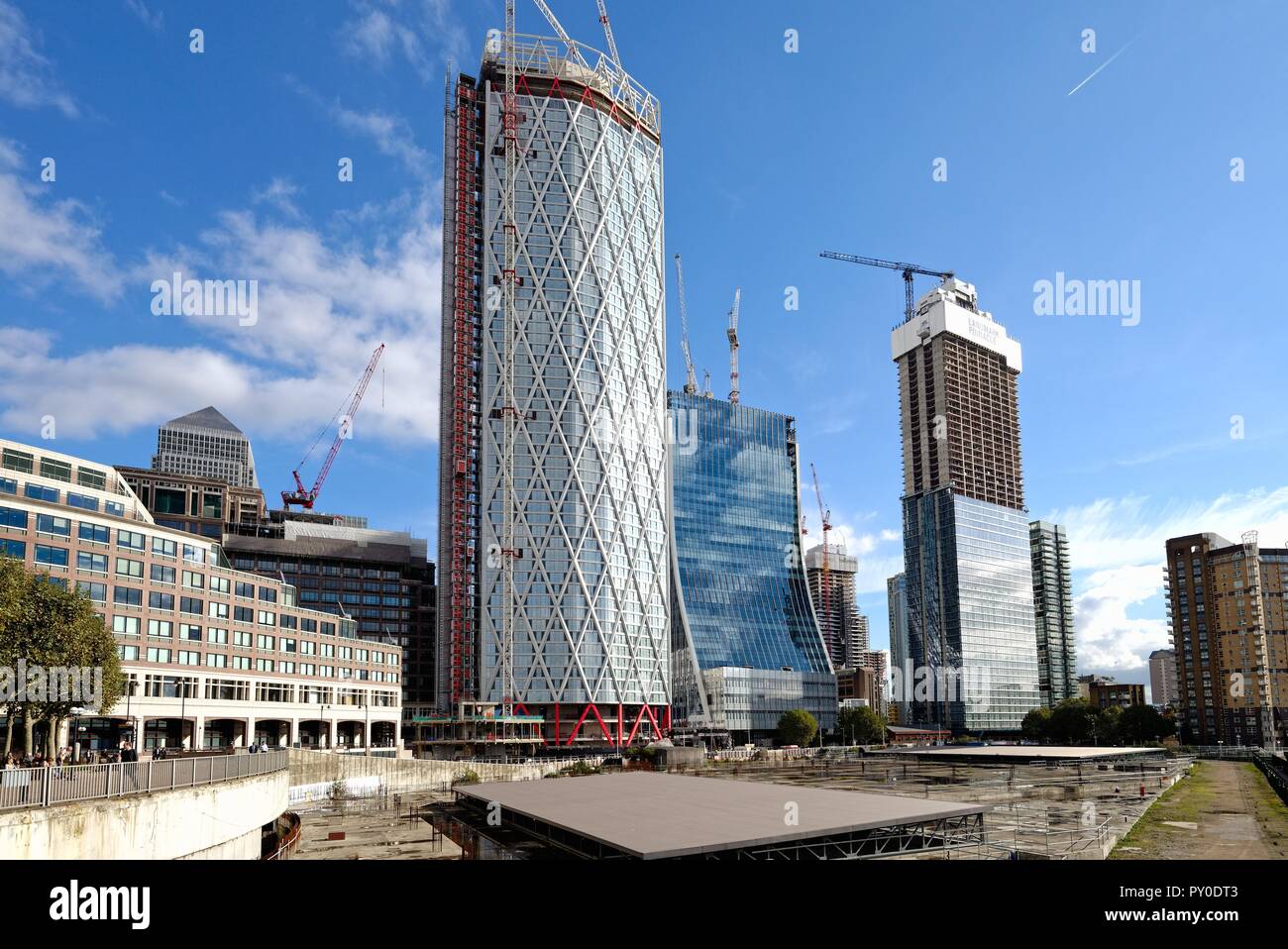 Construction of new office and residential towers at Canary Wharf Docklands London England UK Stock Photo