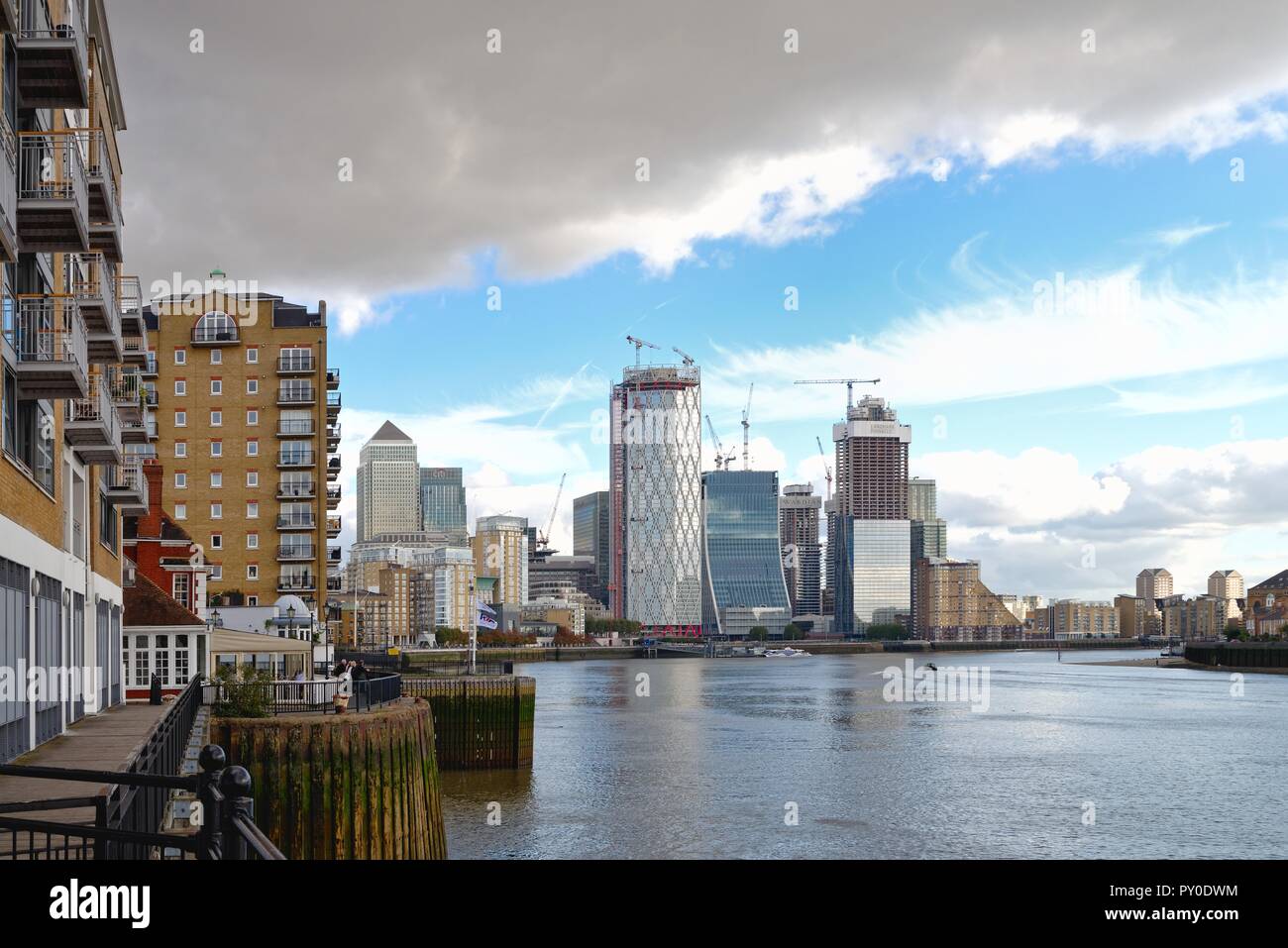 Wide view of the skyscrapers at Canary Wharf with the River Thames in