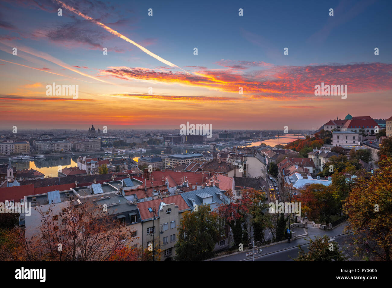 Budapest, Hungary - Aerial skyline view of Budapest at sunrise with beautiful colourful sky and autumn foliage Stock Photo