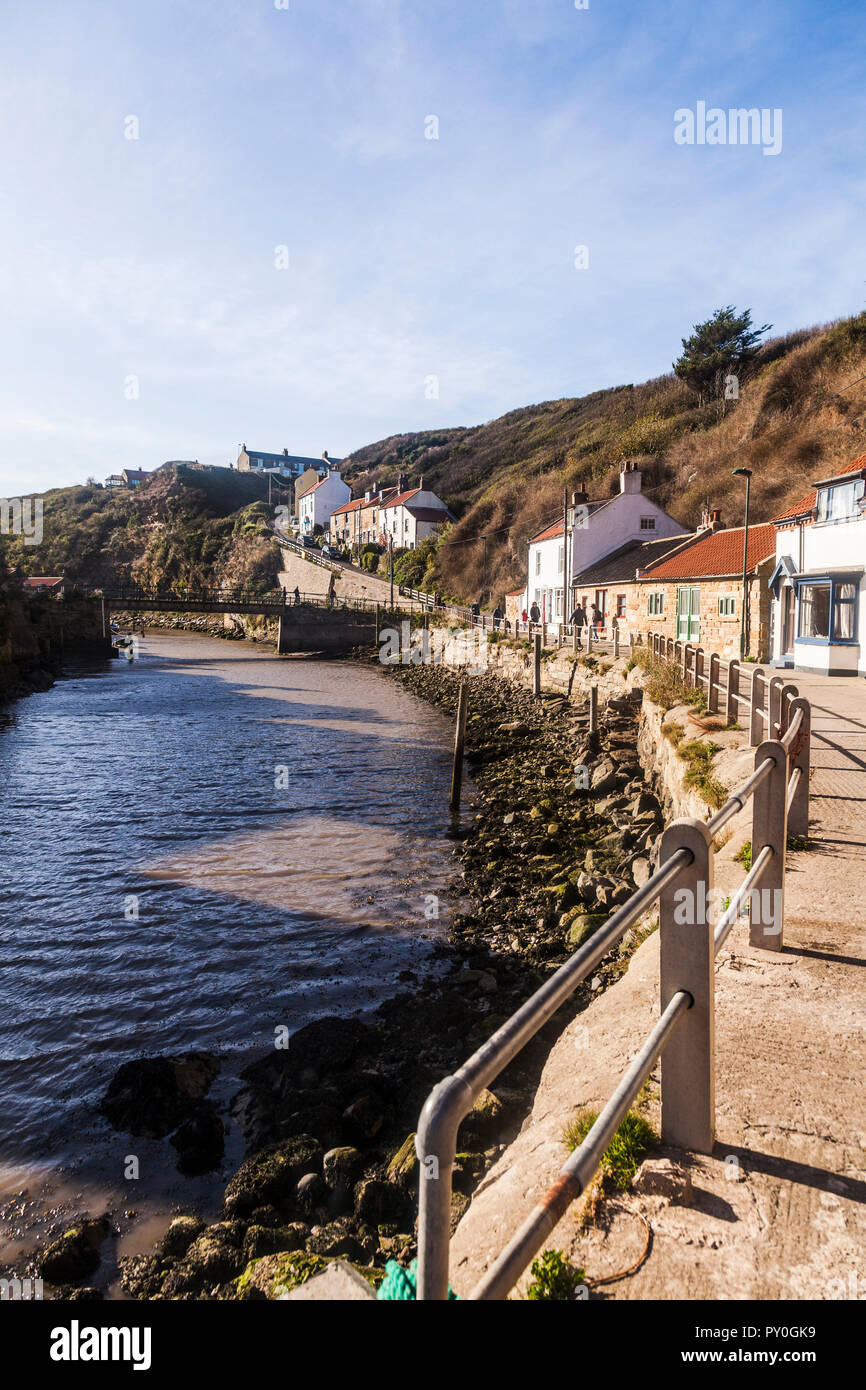 Roxby Beck leading to the harbour at Staithes,North Yorkshire,England,UK. A steep hill leading to the cliff tops. Stock Photo