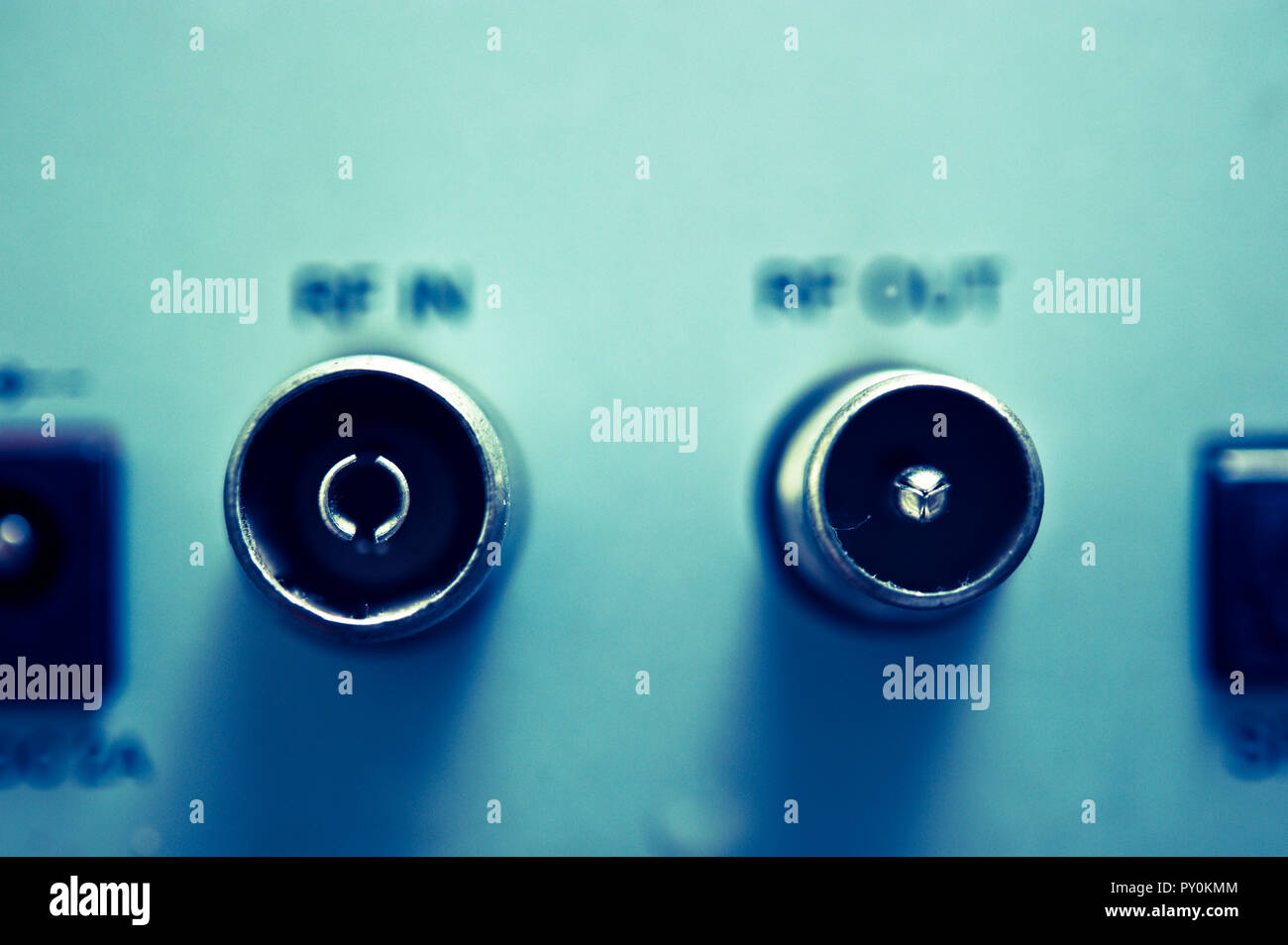 Radio frequency in and radio frequency out sockets in the back of a set-top  box Stock Photo - Alamy