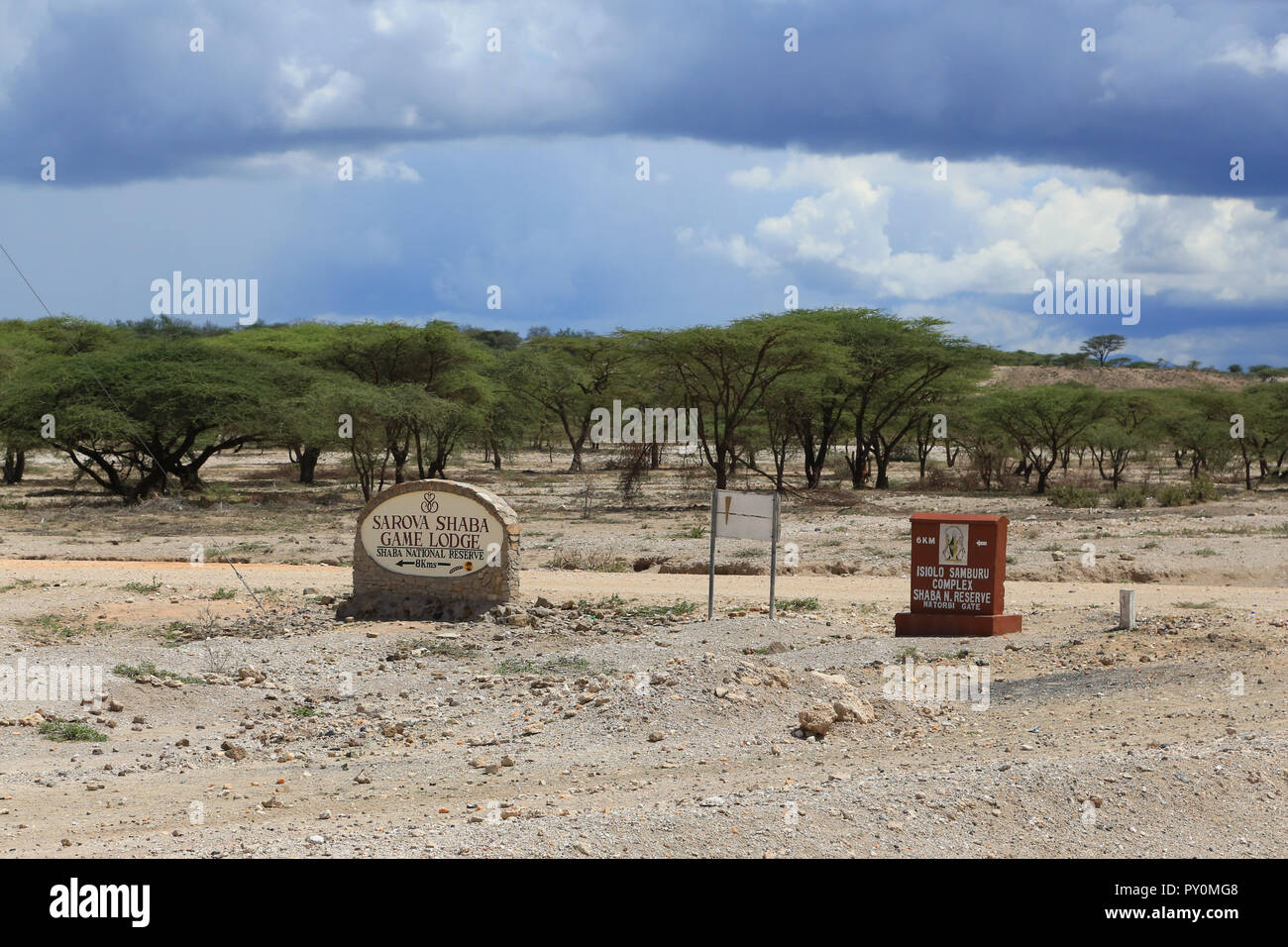 Two signs off Highway A2 in Kenya with directions to the Sarova Shaba Game Lodge in the Shaba National Reserve in Kenya. Stock Photo