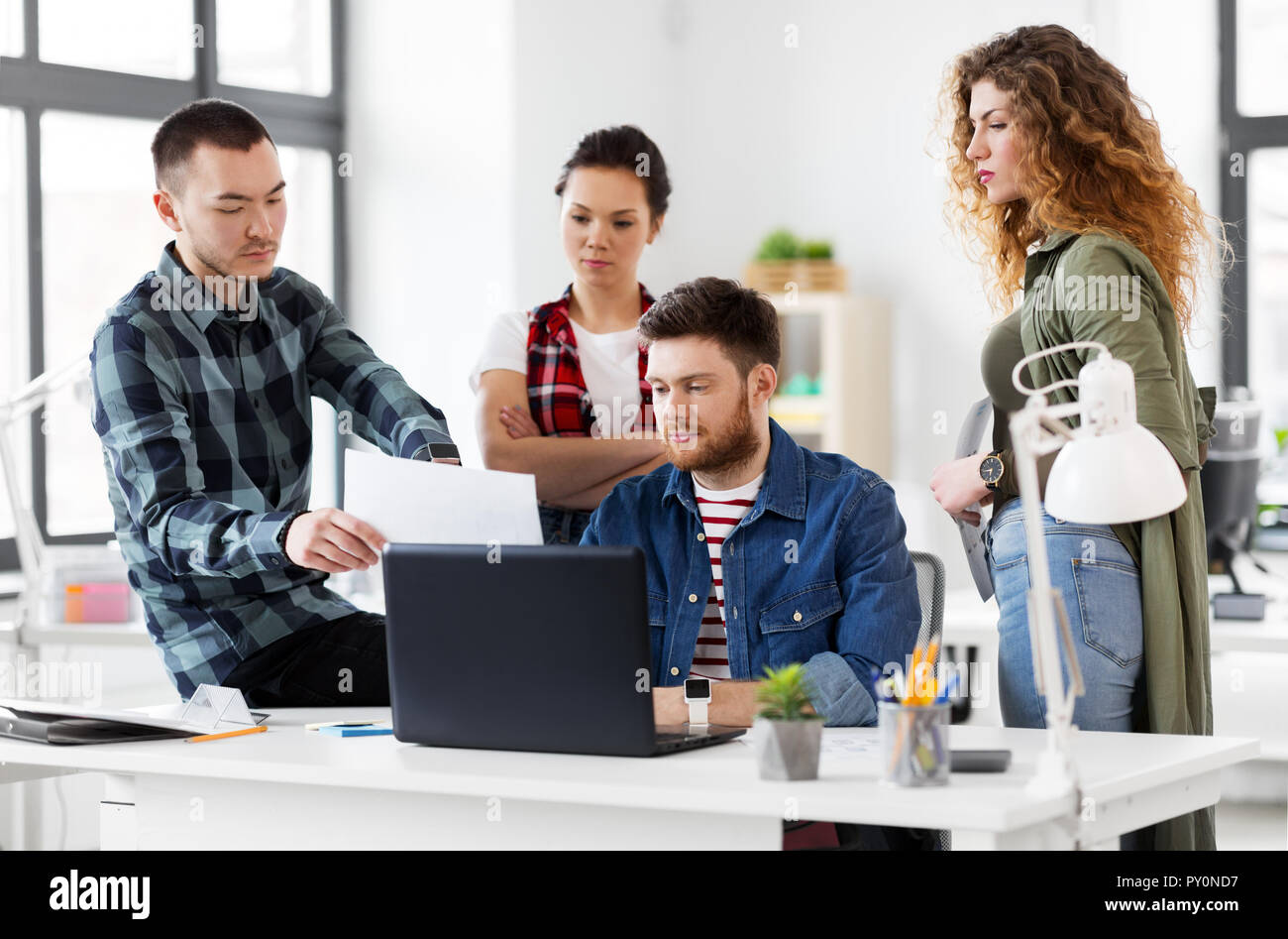 Creative people meeting document hi-res stock photography and images ...