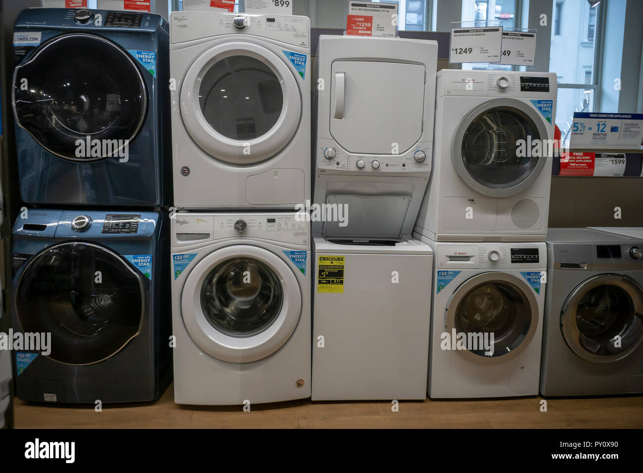 Whirlpool washing machines and dryers, second from left, with other brands  in a hardware store in New York on Monday, October 22, 2018. (Â© Richard B. Levine) Stock Photo