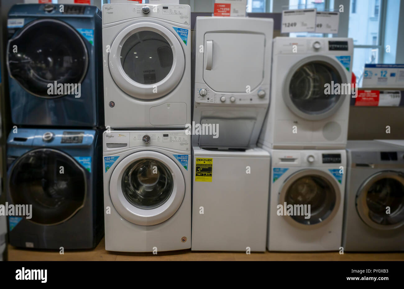 Whirlpool washing machines and dryers, second from left, amidst other brands in a hardware store in New York on Monday, October 22, 2018. (© Richard B. Levine) Stock Photo
