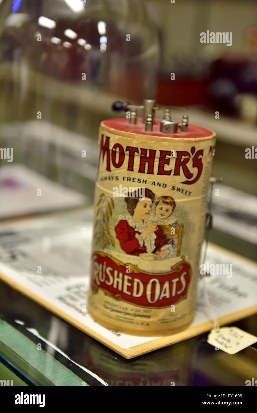 Quaker Oats round carton repurposed and used as core for crystal radio set in the 1920s, exhibit in Antique Wireless Museum in Bloomfield NY, USA. Stock Photo