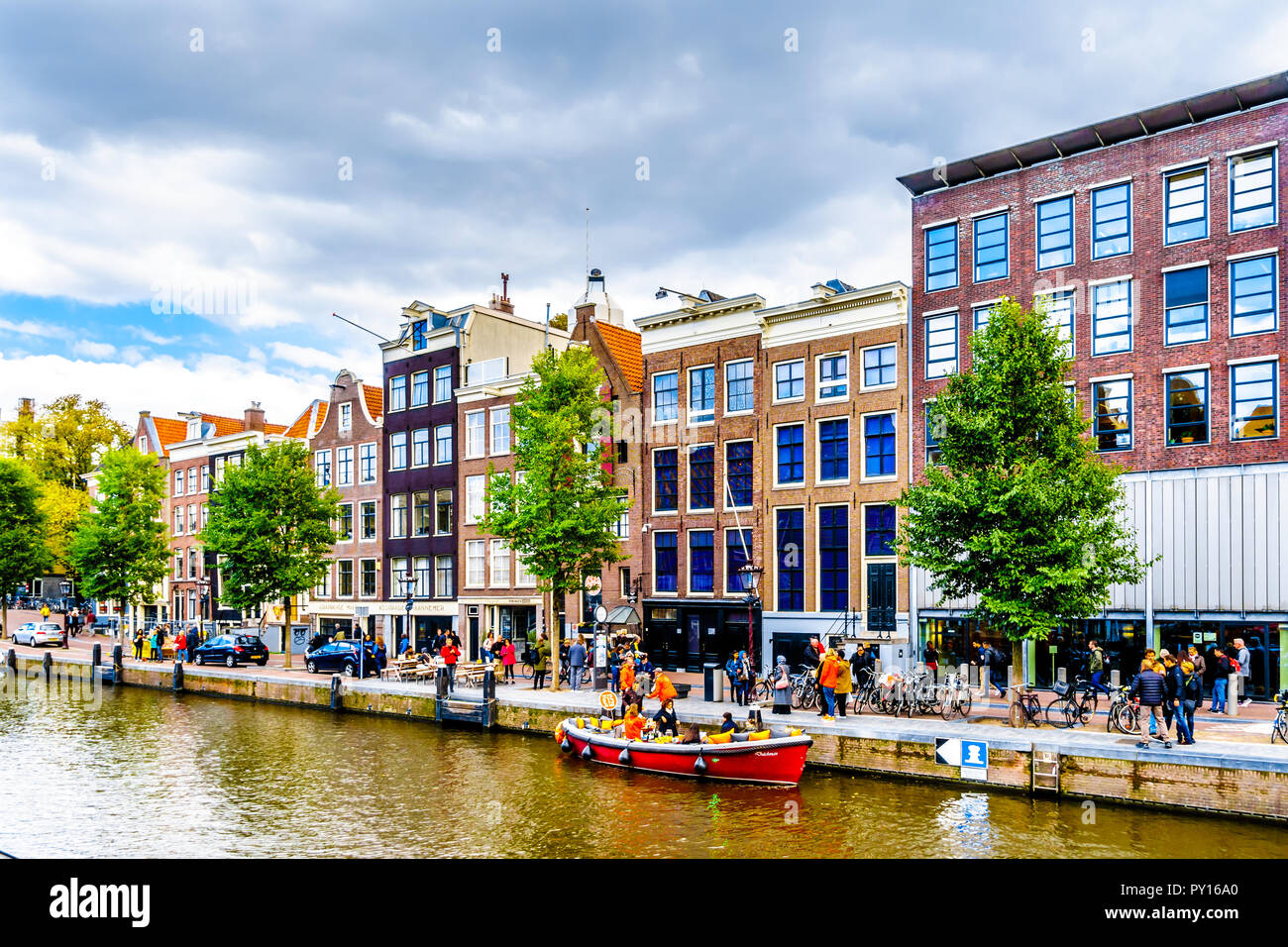 Historic Houses along the Prinsengracht canal in the Jordaan neighborhood  with Anne Frank House in the city center of Amsterdam, the Netherlands  Stock Photo - Alamy