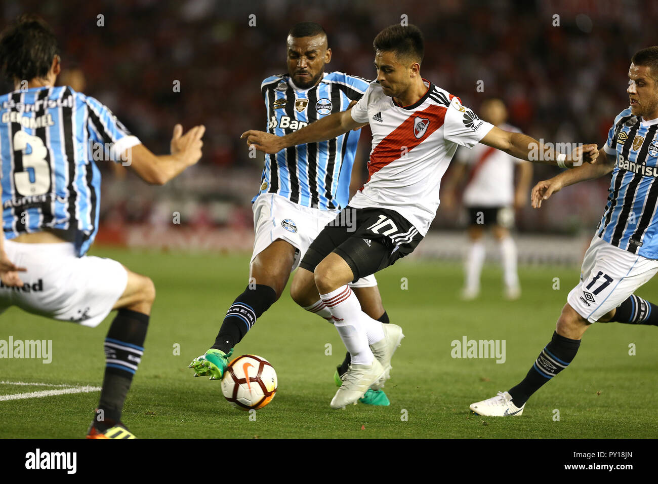 Buenos Aires, Argentina - October 23, 2018: Gonzalo Martinez (river) is cut by the defense in the Monumental Stadium in Buenos Aires, Argentina Stock Photo