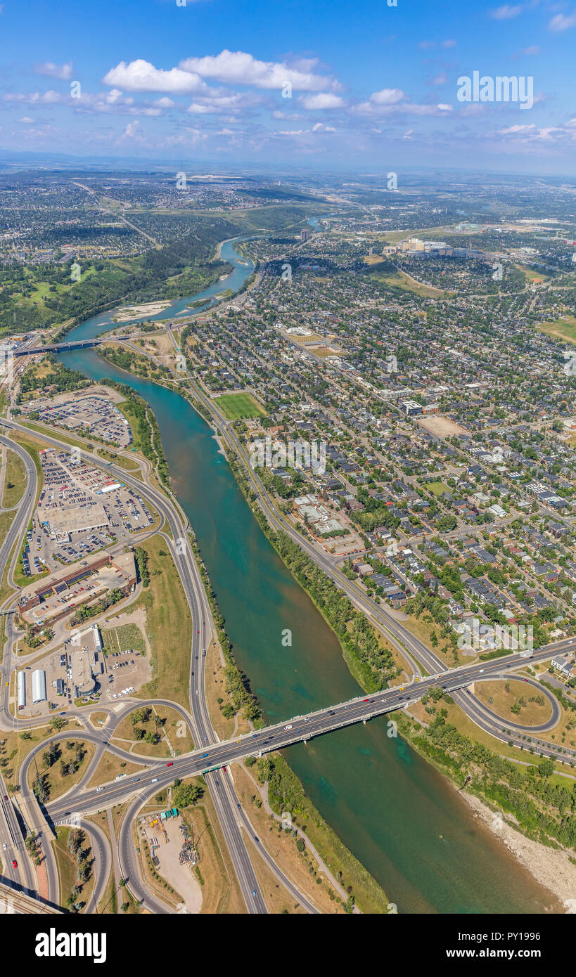 Aerial view of Calgary's bow river east of downtown looking towards the mountains. Stock Photo
