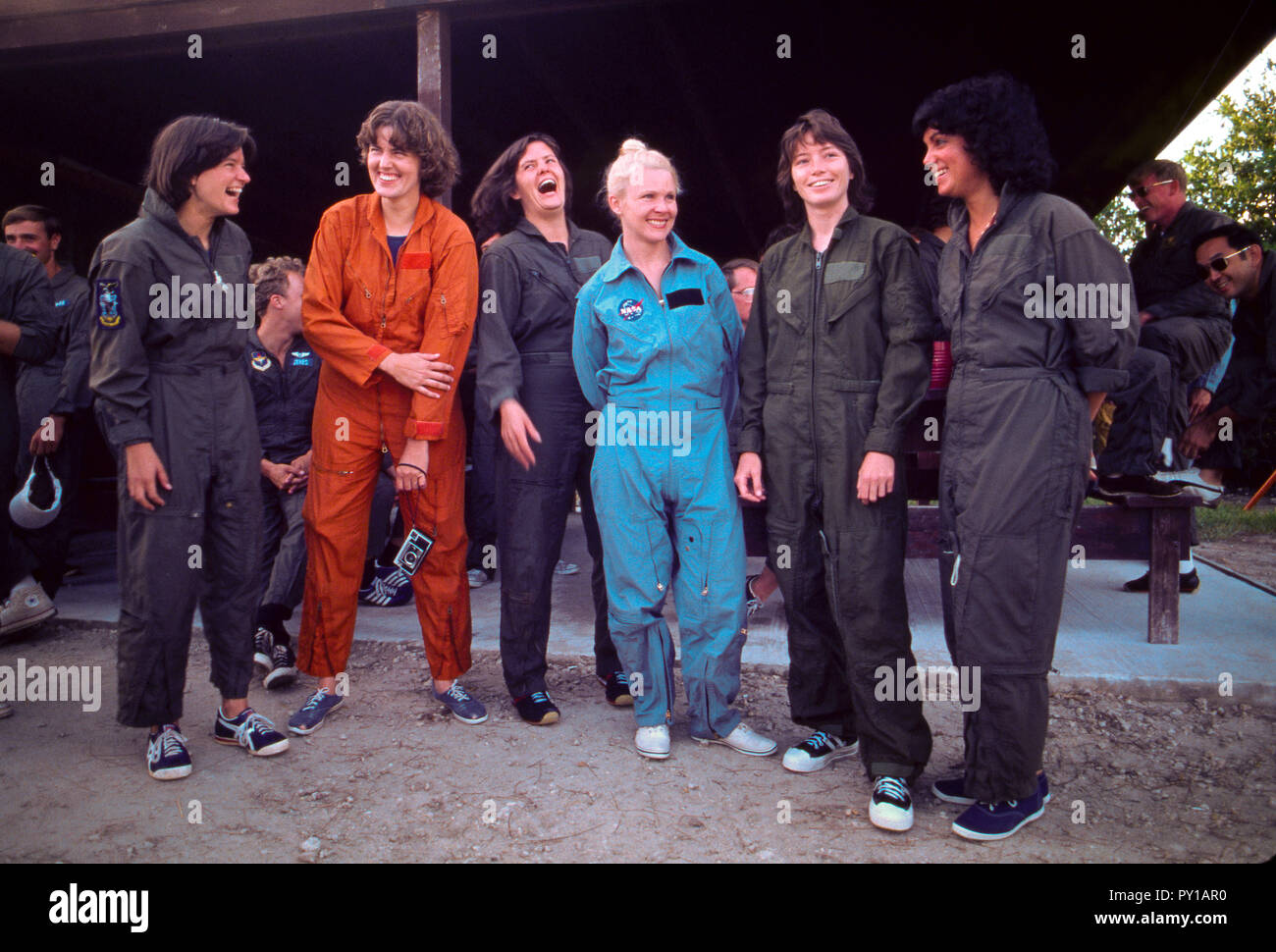 The first female NASA astronauts take a break after they qualify in US Air Force Water Survival School at Turkey Point, Florida. Left to right are: Sally K. Ride, Shannon W. Lucid, Kathryn D. Sullivan, Margaret 'Rhea' Seddon, Anna L. Fisher, Judith A. Resnik Stock Photo