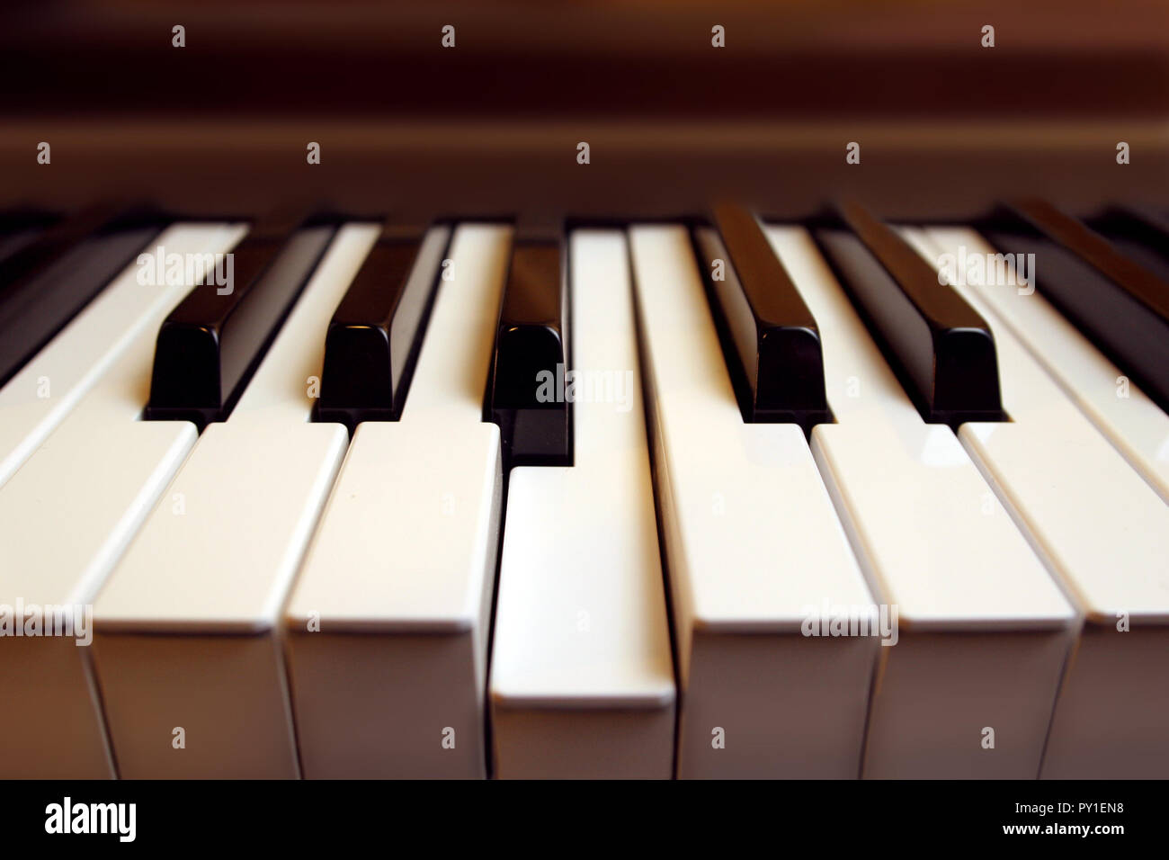Close-up of piano keyboard, one key pressed Stock Photo - Alamy