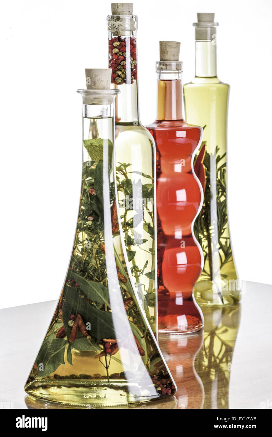Essig und Oel in verschiedenen Glasflaschen Stock Photo