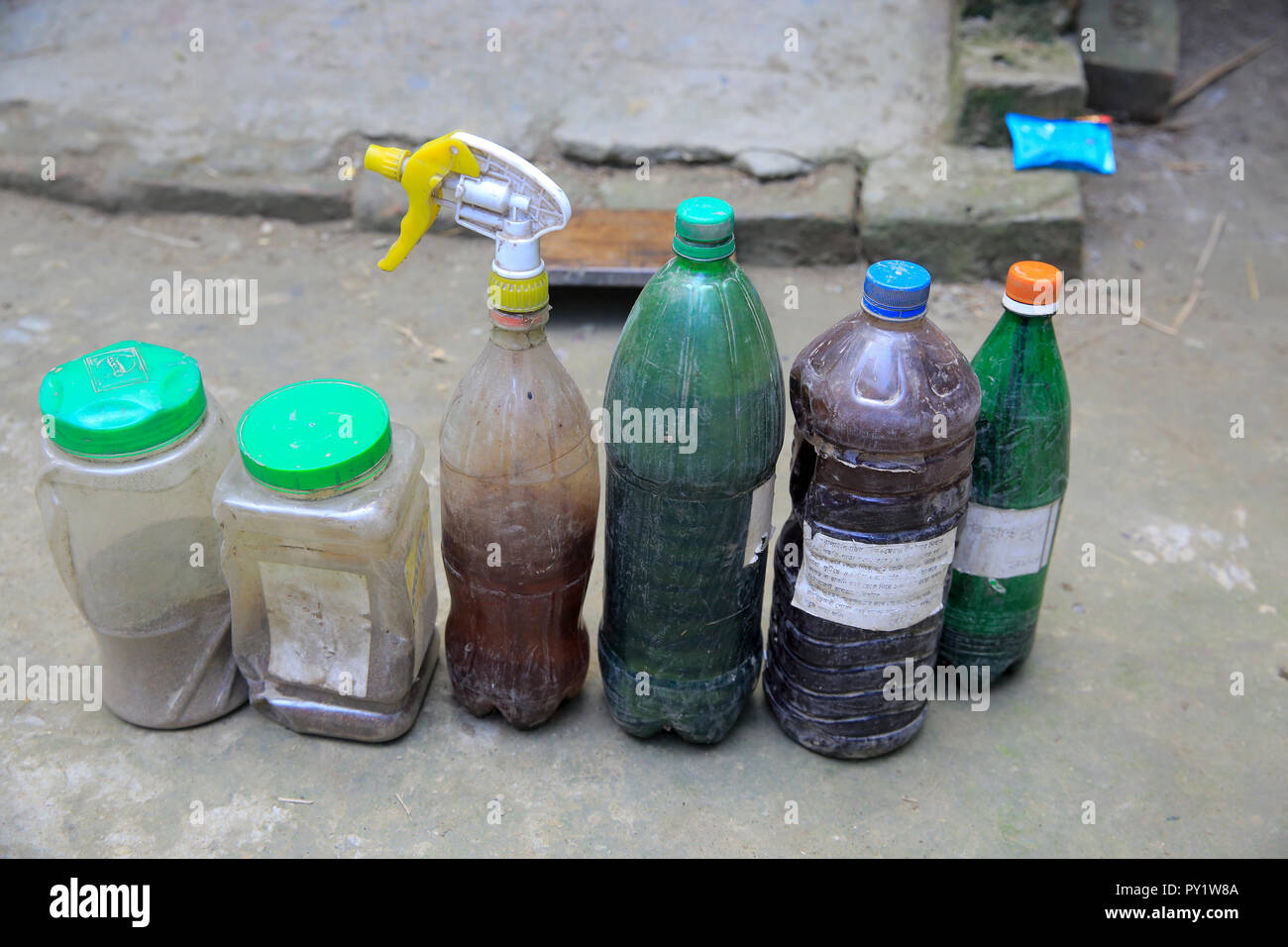 Bio-pesticide in bottles for organic farm. Manikganj, Bangladesh Stock Photo