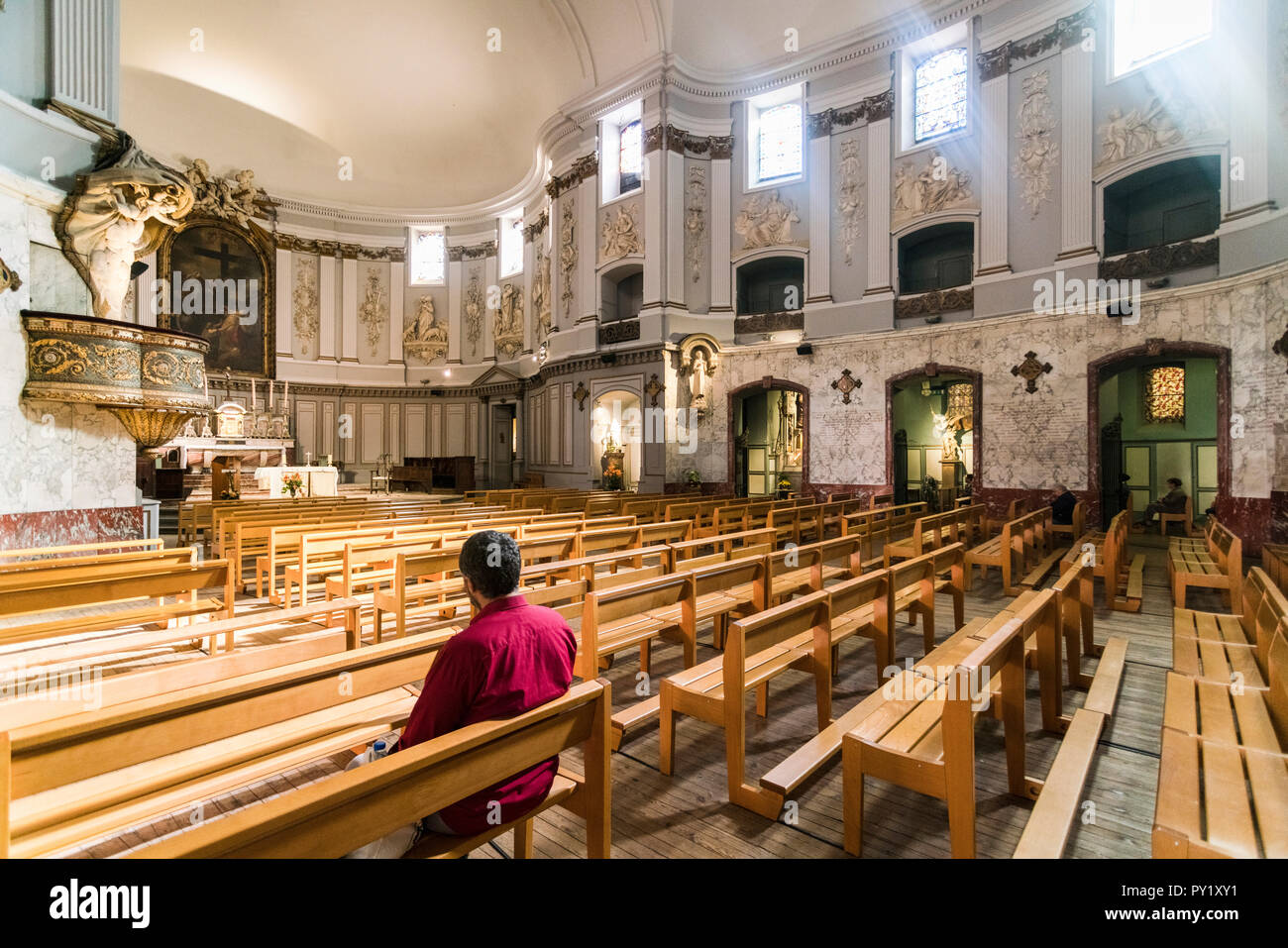 Saint-Jerome church interior with people in it, Toulouse, Occitanie, France Stock Photo