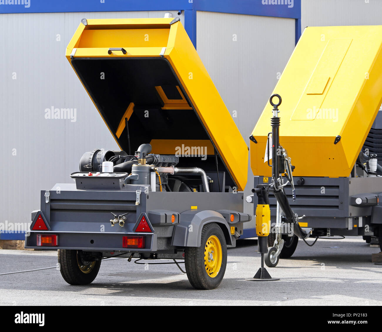 Mobile air compressor unit at construction site Stock Photo Alamy