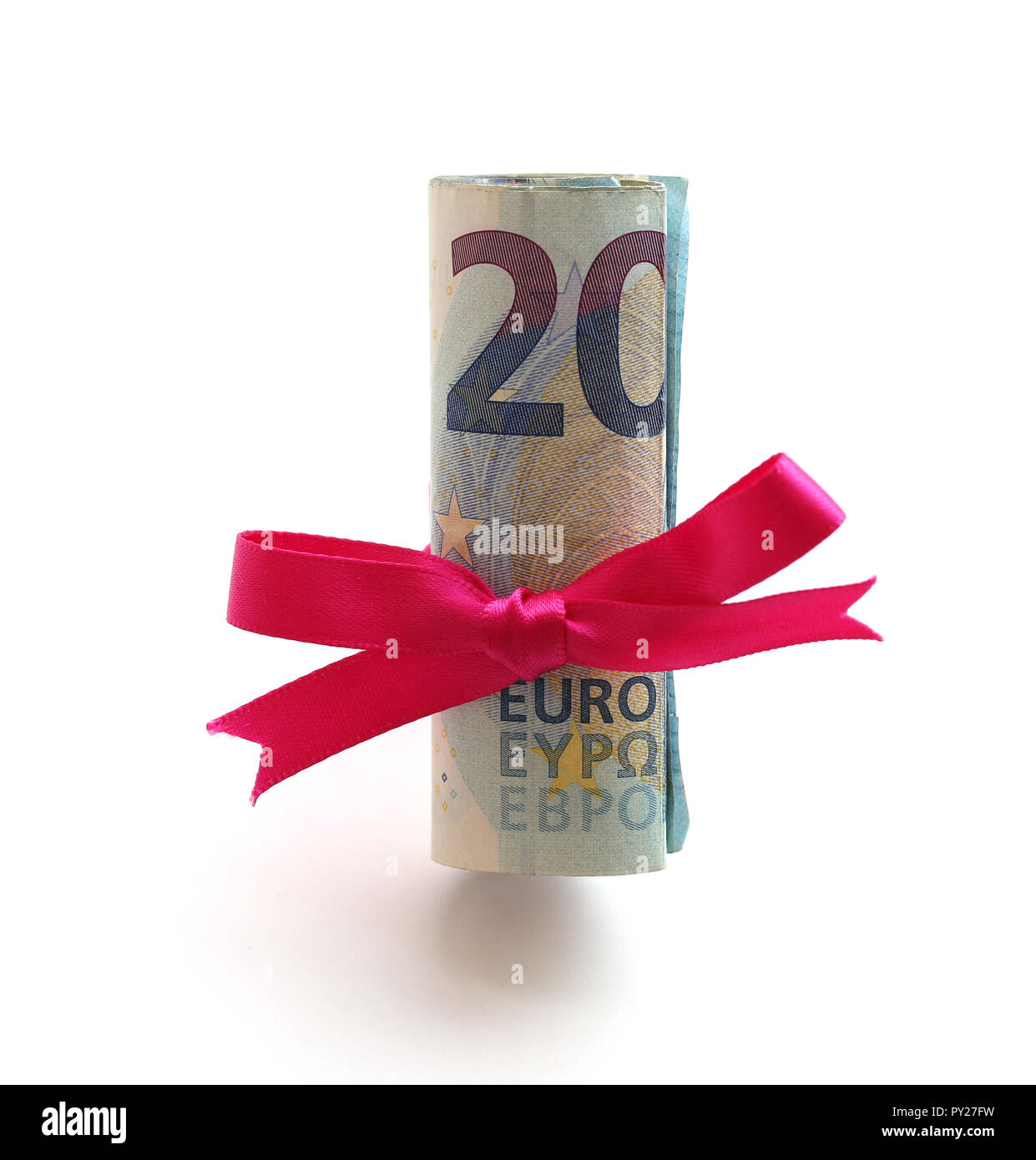 20 euro bills rolled up and wrapped in a pink ribbon Stock Photo