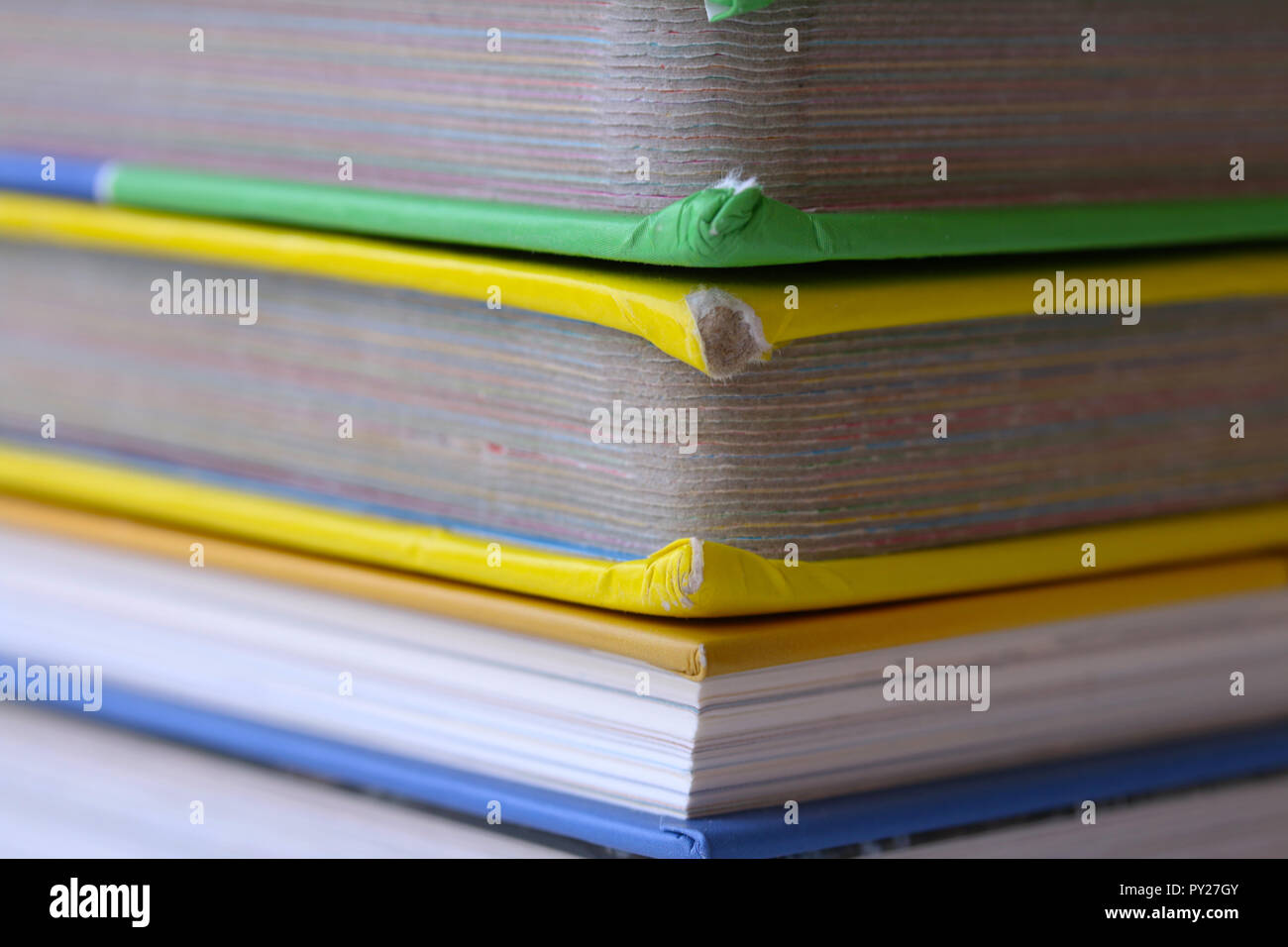 Side view of old stacked books Stock Photo