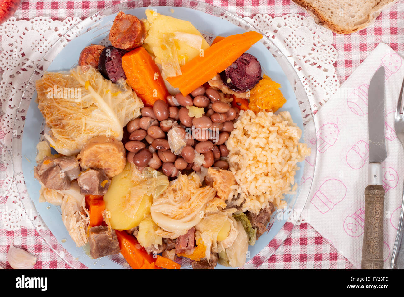 Traditional cozido portuguese boiled stew with beef, bacon, vegetables