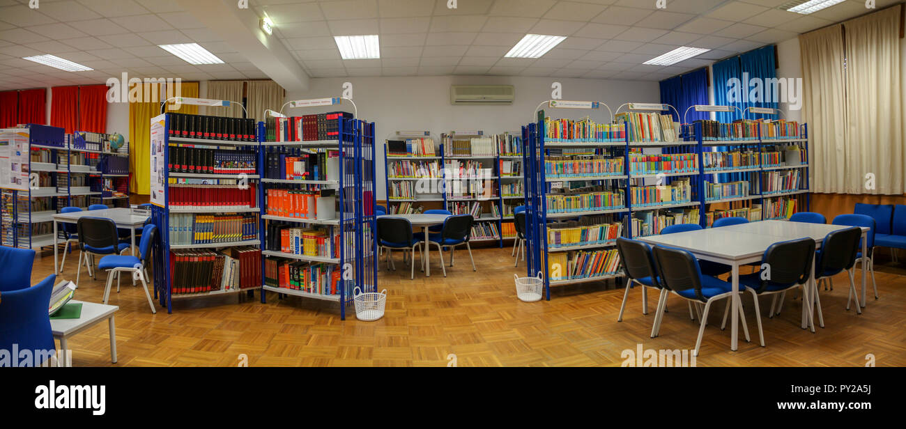 Interior view of a school library with books and table for study Stock ...