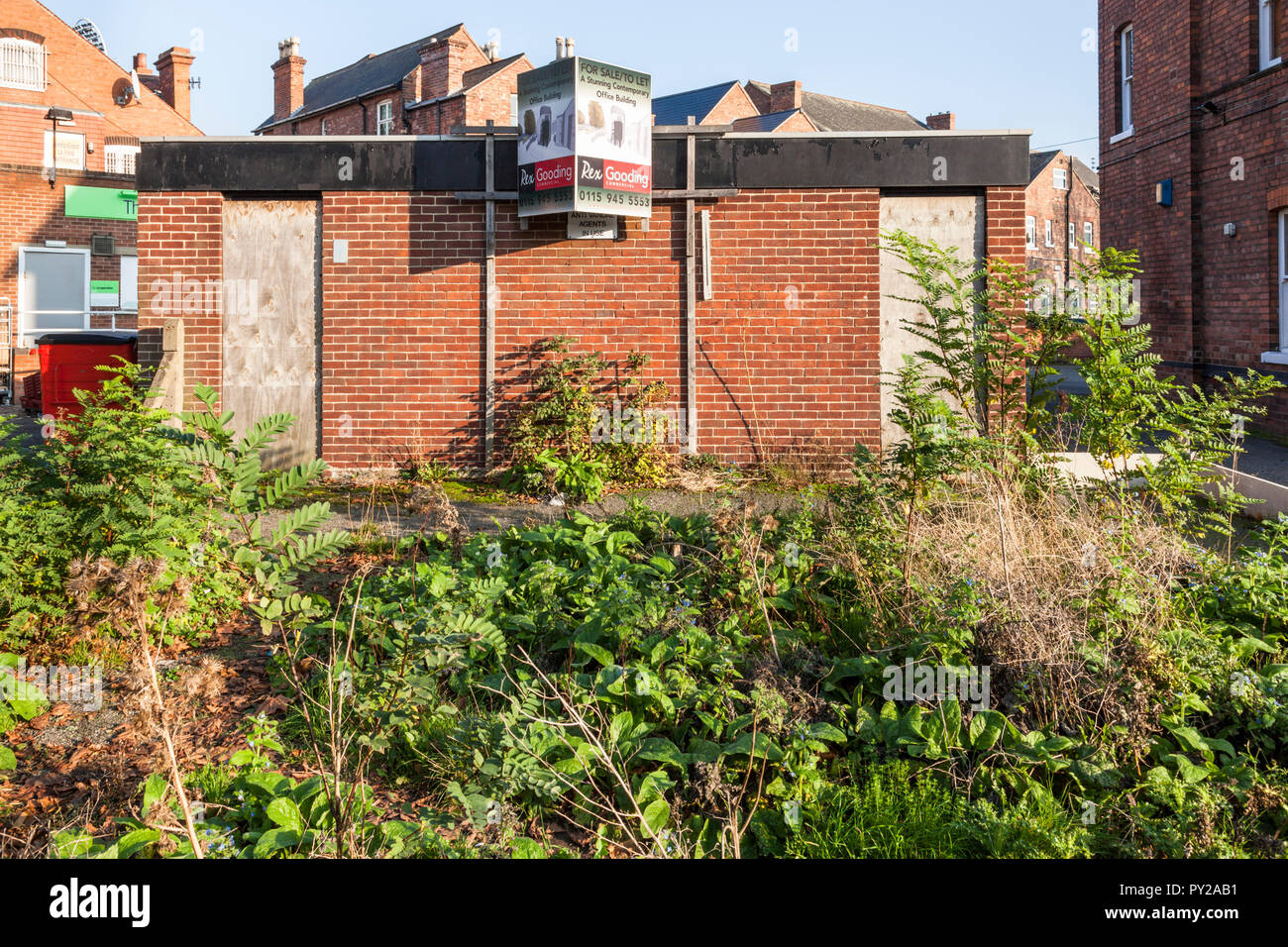 Small brownfield site. Closed public toilet for sale or to let and available for change of use, West Bridgford, Nottinghamshire, England, UK Stock Photo