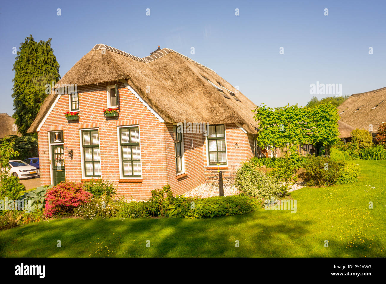 Giethoorn, Netherlands 26 May A facade of an old cottage house at