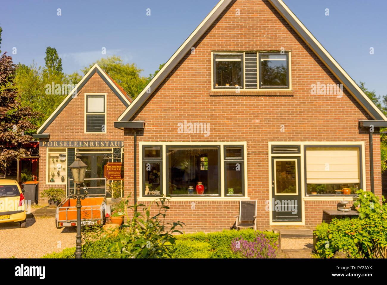 Giethoorn, Netherlands 26 May A facade of an old cottage house at