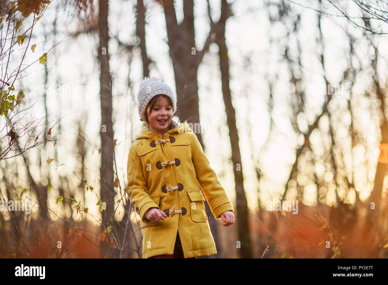 Portrait of a smiling girl in the woods, United States Stock Photo