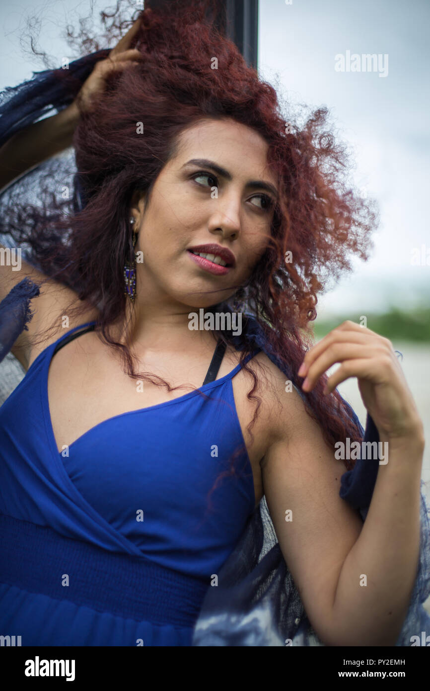 Woman long curly hair blowing hi-res stock photography and images - Alamy