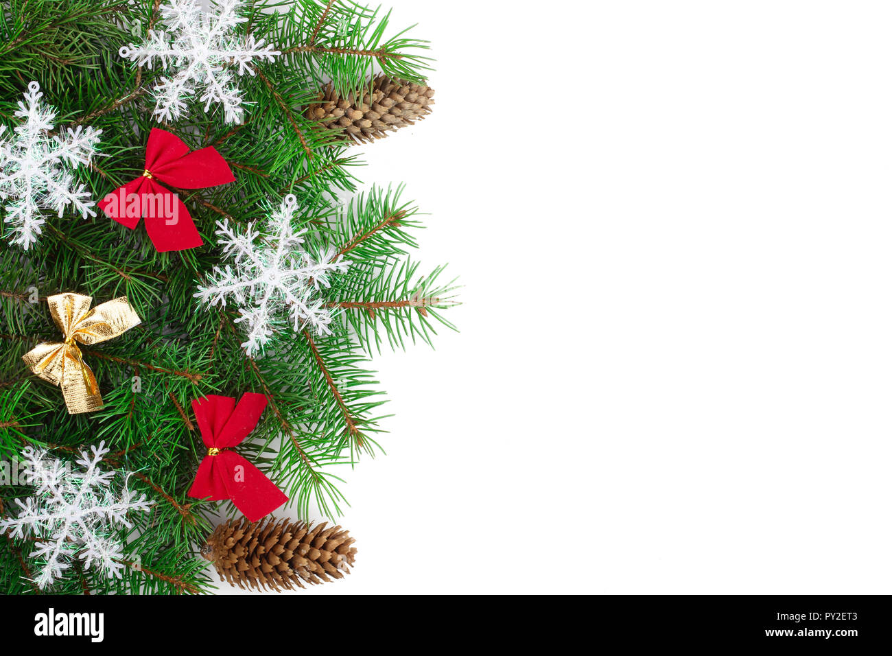 Christmas background with balls and decorations isolated on white with copy space for your text. Top view. Stock Photo