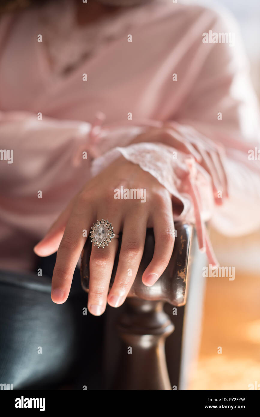 Diamond ring on a woman's hand Stock Photo