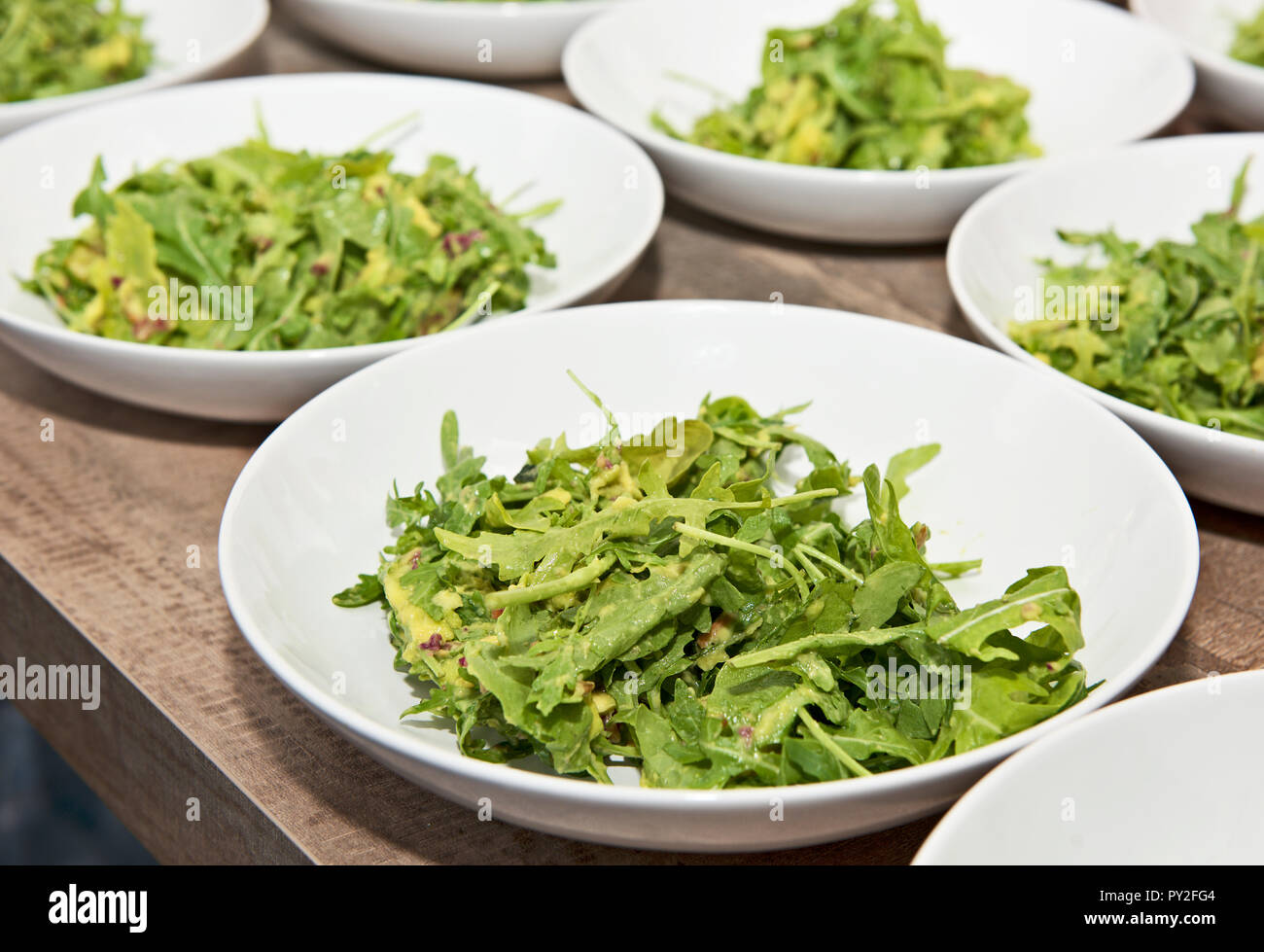 Plates of avocado salad with yogurt dressing Stock Photo Alamy