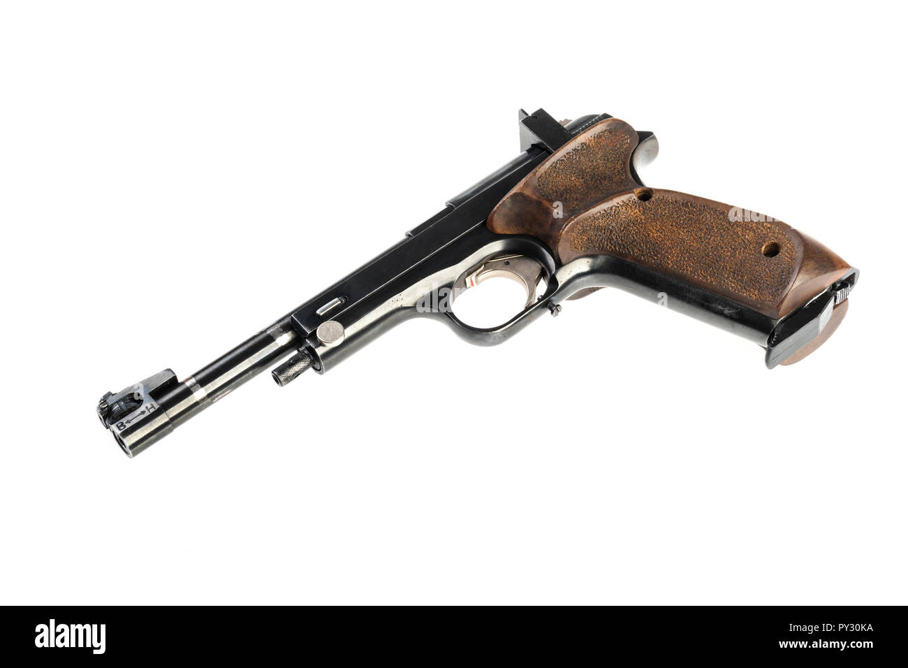 isolated used old sports pistol on a white background Stock Photo - Alamy